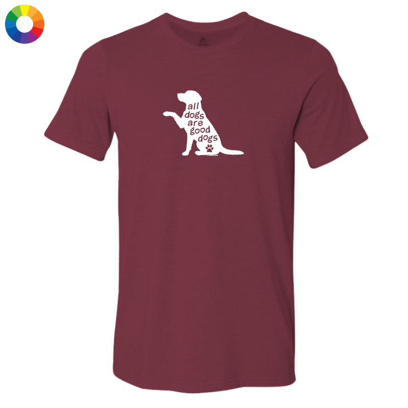 A maroon short-sleeve crewneck t-shirt with a white graphic of a dog silhouette containing the text 'all dogs are good dogs' and a small paw print. A multicolor color wheel icon is visible in the top-left corner.