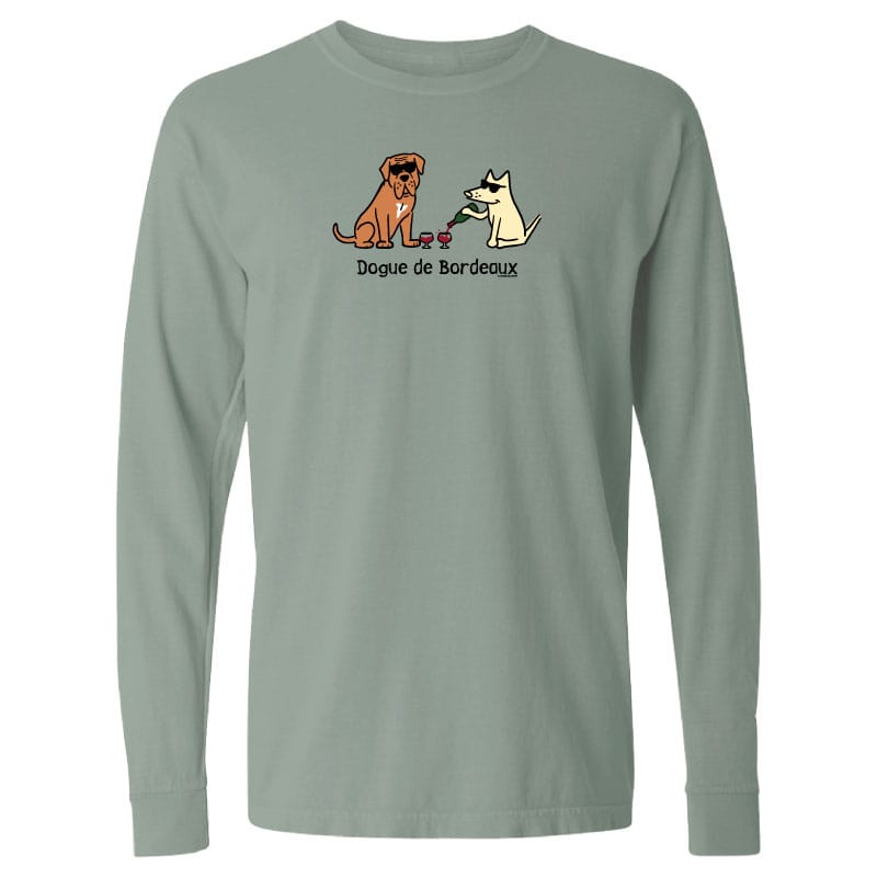 Green long-sleeve shirt with a graphic of two dogs and text on a white background