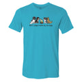 A bright turquoise blue short-sleeve t-shirt with a cartoon graphic of four dogs of different sizes sitting together with a small sandwich, and the text 'don't judge a bark by its size' printed below.