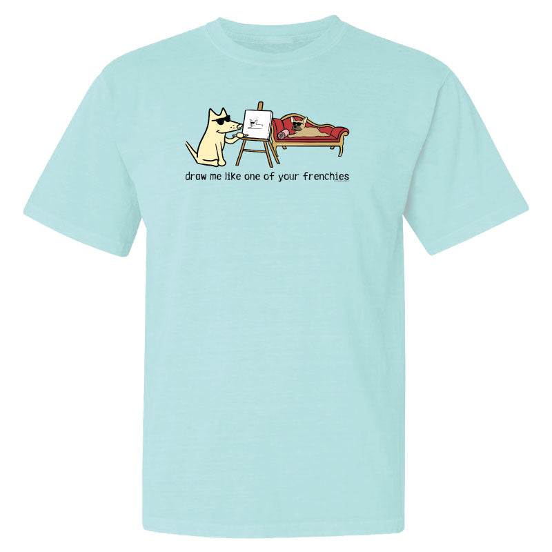 Light blue t-shirt with a cartoon dog graphic and text on a white background