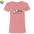 Pink t-shirt with a cartoon design of a cat drawing a dog, on a white background.