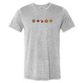A heather gray short-sleeve crewneck t-shirt featuring a small horizontal graphic of autumn-themed icons (a paw print, a red maple leaf, a turkey, a pumpkin, and a sunflower) printed across the chest.