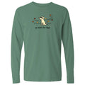 A sage green long-sleeve t-shirt with a cartoon graphic of a dog surrounded by flowers and the text 'go with the flow!' printed on the chest, displayed on a solid white background.