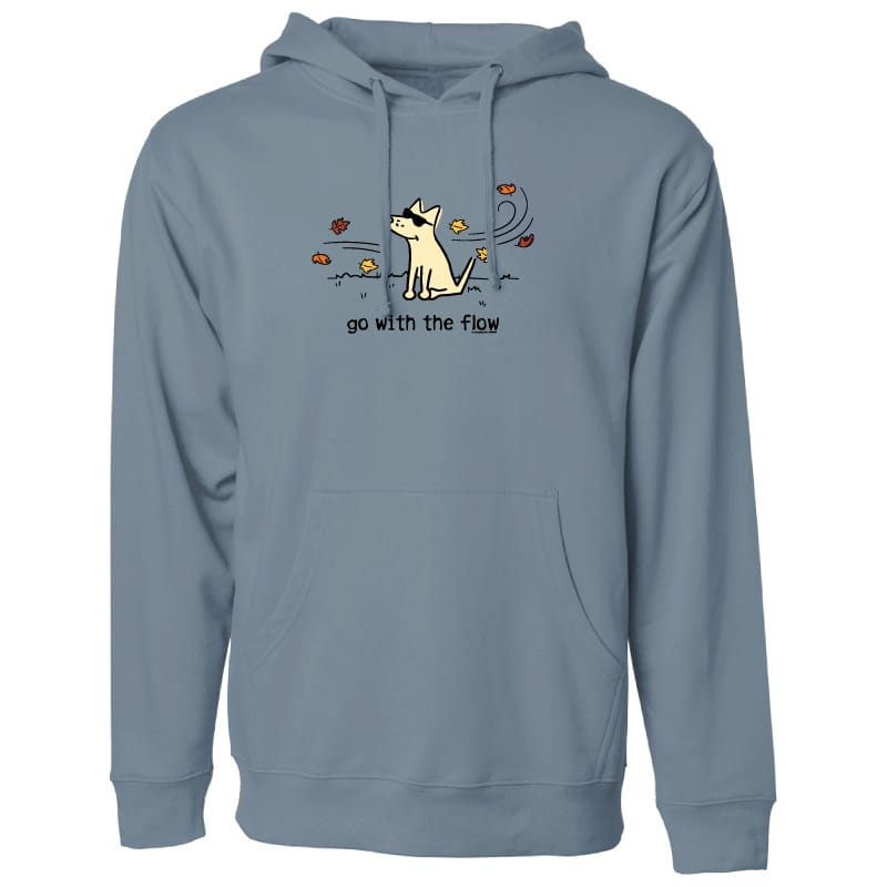 A dusty blue-gray pullover hoodie with a front graphic of a white dog sitting amidst autumn leaves, with the text 'go with the flow' printed below. The hoodie is shown against a plain white background.