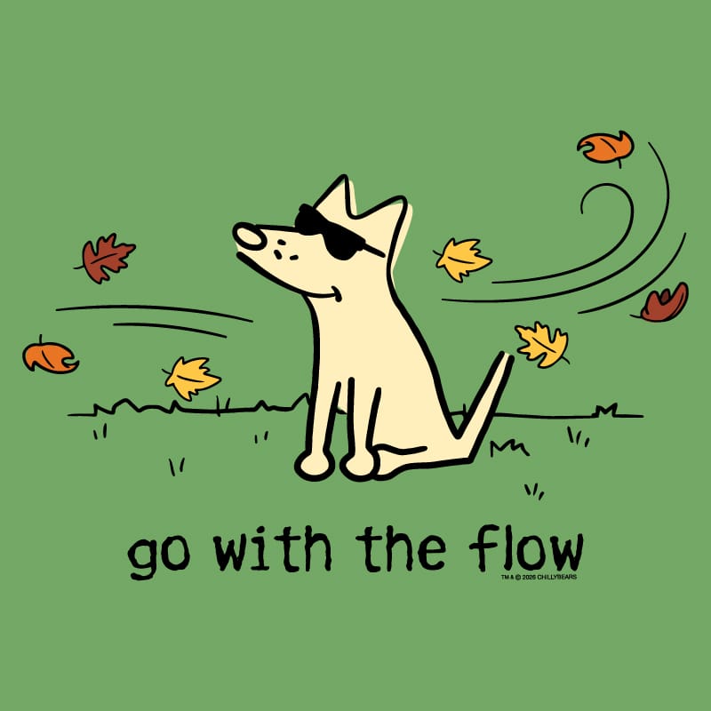 A green graphic print featuring a cartoon dog wearing black sunglasses, sitting on grass with falling autumn leaves around it and the text 'go with the flow' below. Small text at the bottom right reads '16+4 DREAM CHILDREN'.