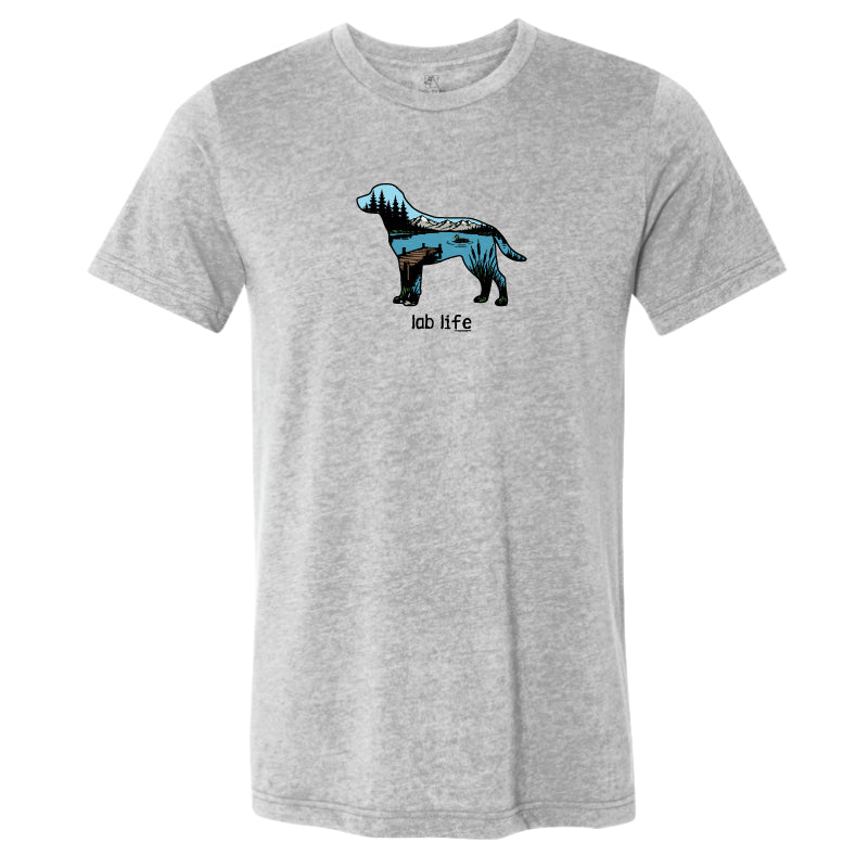 A heather gray short-sleeve crewneck t-shirt featuring a cartoon graphic of a yellow cat sitting under a green tree with the text 'read relax repeat.' printed below it.