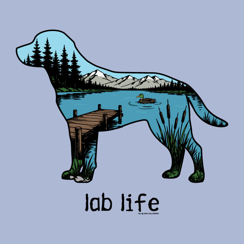 A stylized dog silhouette filled with a scenic landscape illustration, including mountains, a lake, dock, trees, and a duck, with the text 'lab life' below on a light blue background.