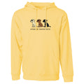 A light yellow pullover hoodie with a front graphic showing three dogs and the text 'untouched burnt.' on the chest, displayed against a solid white background.