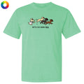 A mint green short-sleeve t-shirt with a graphic of cartoon dogs running and the text 'let's run some labs' printed on the chest, displayed on a solid white background.