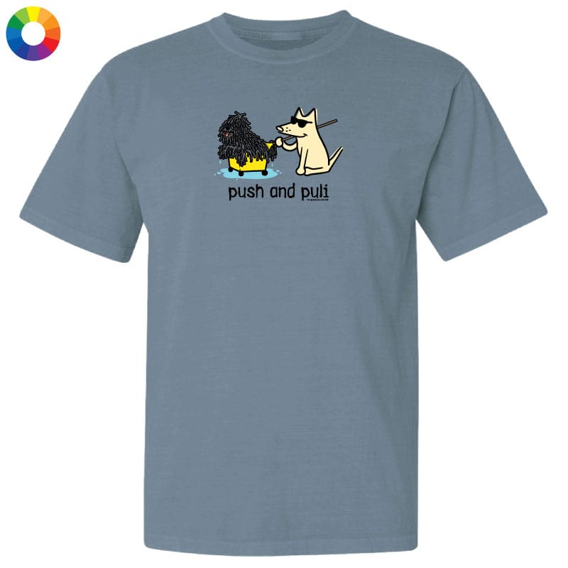 Blue t-shirt with cartoon dogs and text 'push and pull' on a white background