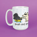 Mug with cartoon design of two dogs and text 'push and pull' on a purple background