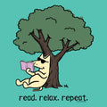 A cartoon illustration of a cream-colored cat sitting under a large green tree and reading a pink book, with the text 'read. relax.