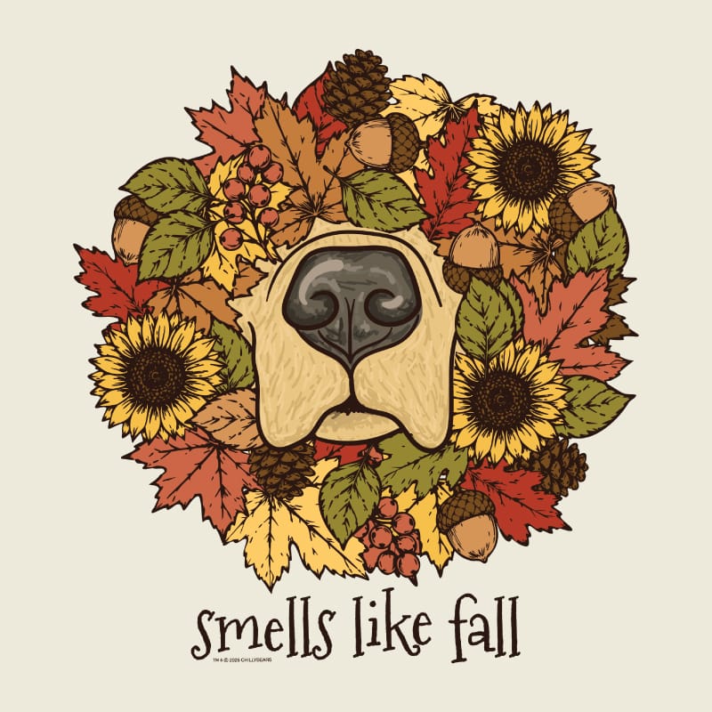 An autumn-themed illustration featuring a dog's snout surrounded by sunflowers, maple leaves, acorns, pinecones, and berries, with the text 'smells like fall' below on a light beige background.