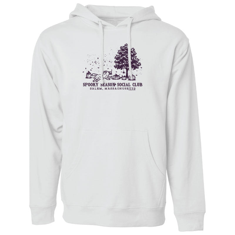 A white pullover hoodie with a dark purple graphic on the chest depicting a tree, a dog, and the text 'SPOOKY SEASON SOCIAL CLUB' and 'PALM, MASSACHUSETTS'.
