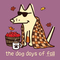 A stylized fall-themed illustration on a purple background showing a cream-colored dog wearing black sunglasses, wrapped in an orange and brown plaid blanket, sitting beside a basket of red apples and a white mug with a black paw print. The text at the bottom reads 'the dog days of fall' with a small 'T© 2024 CHERRYBEARS' mark.