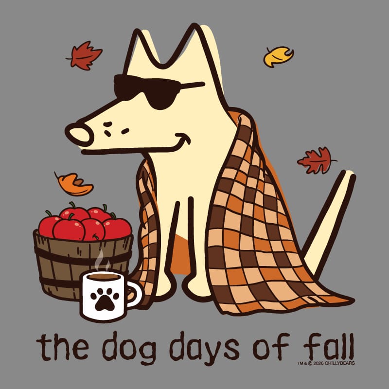 A stylized fall-themed illustration on a gray background showing a cream-colored dog wearing dark sunglasses, wrapped in an orange and brown plaid blanket, with red apples in a basket, a white mug with a paw print, and the text 'the dog days of fall' below.