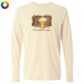 A cream-colored long-sleeve t-shirt with a central graphic of a yellow dog sitting in a forest of trees with autumn leaves, and the text 'The trees they see are a dreamer' underneath. A multicolor color wheel icon is in the top-left corner.