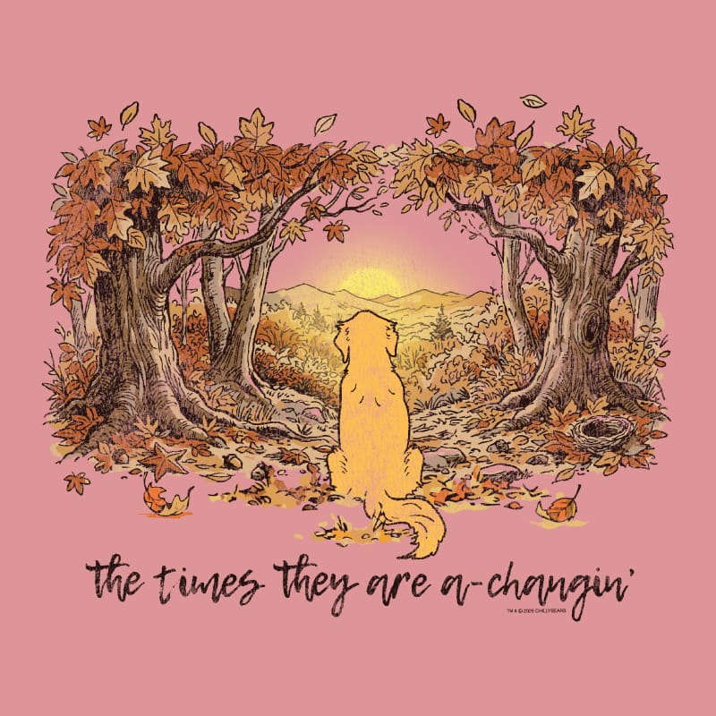 A square graphic print featuring an illustration of a golden retriever dog sitting in a forest of autumn trees, looking towards a sunset over mountains. Below the illustration, the handwritten text reads 'the times they are a-changin''.