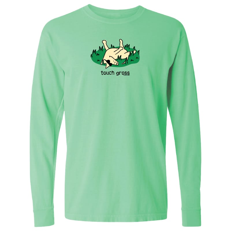 A mint green long-sleeve t-shirt with a graphic of a cartoon cat rolling on grass and the text 'touch grass' printed below it, displayed on a solid white background.